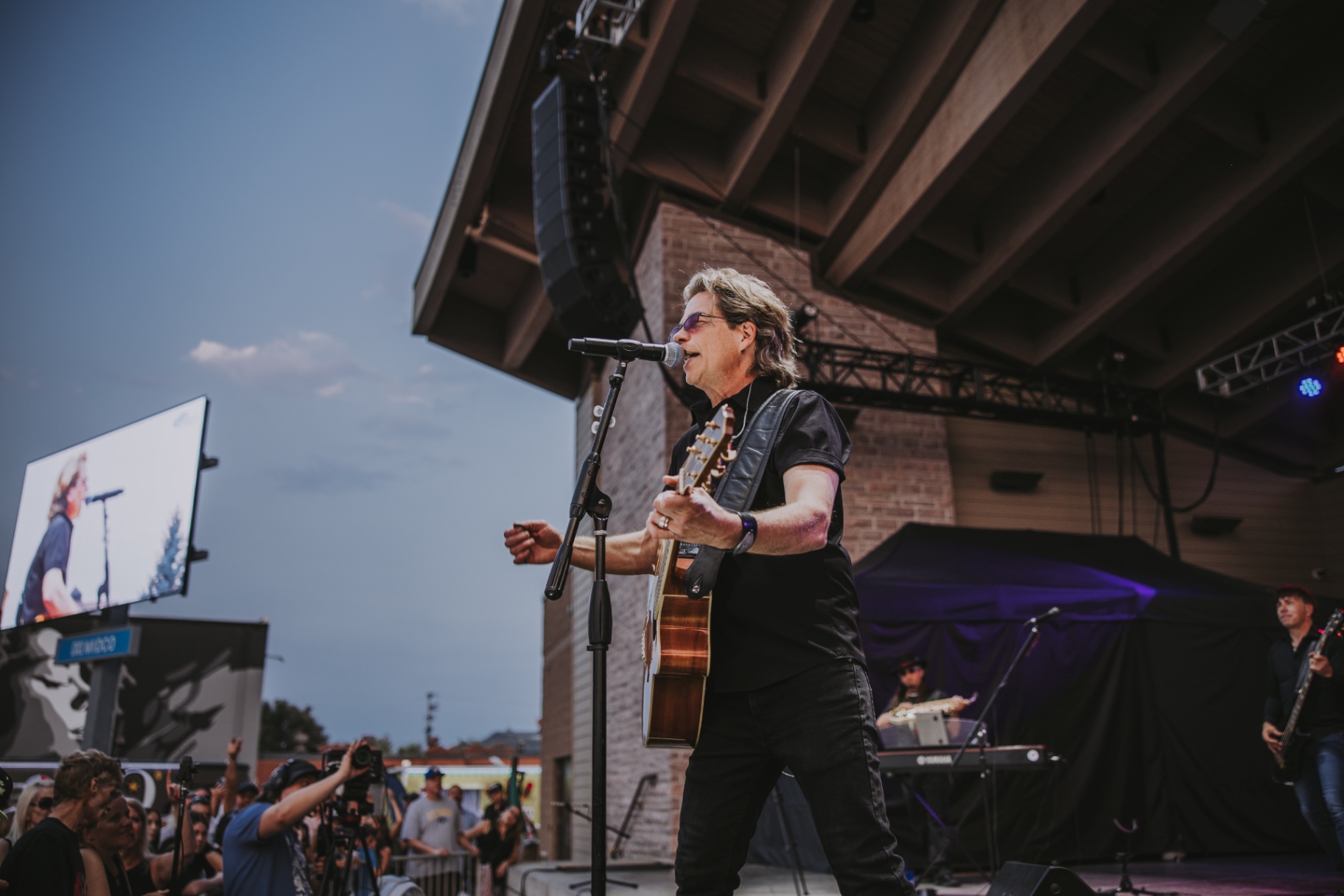 Frame from the KORY and the FIREFLIES concert at Levitt at the Falls in Sioux Falls
