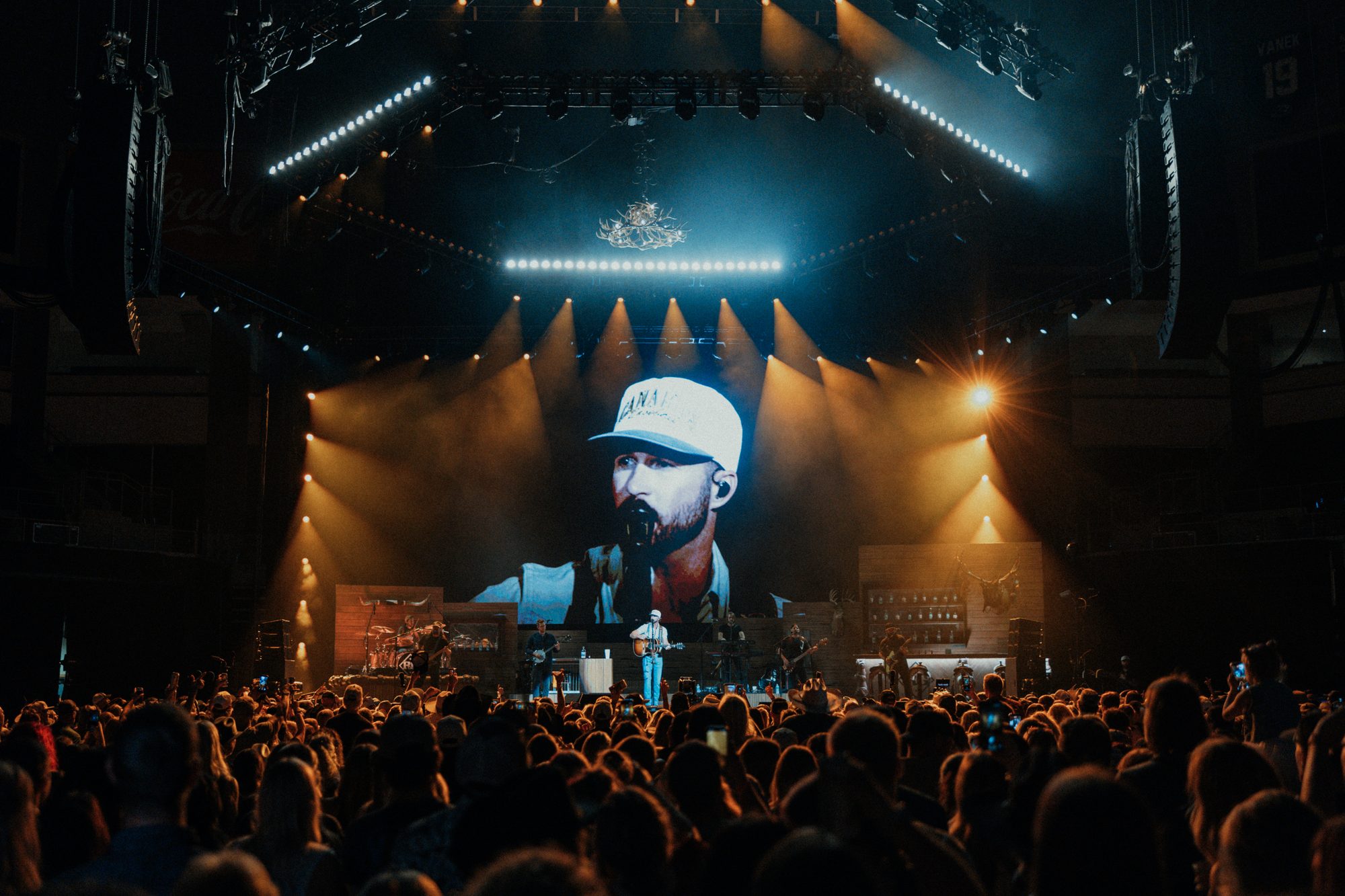 Wide view of the Riley Green stage and packed floor at the Denny Sanford PREMIER Center in Sioux Falls