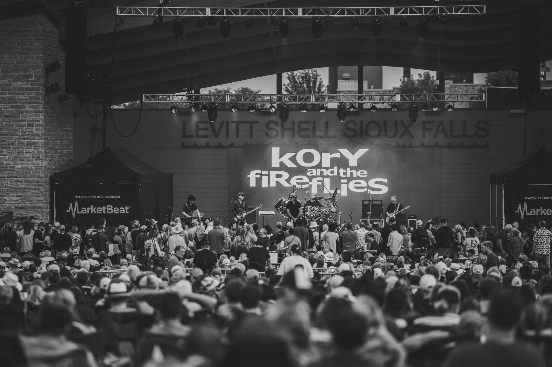 Frame from the KORY and the FIREFLIES concert at Levitt at the Falls in Sioux Falls